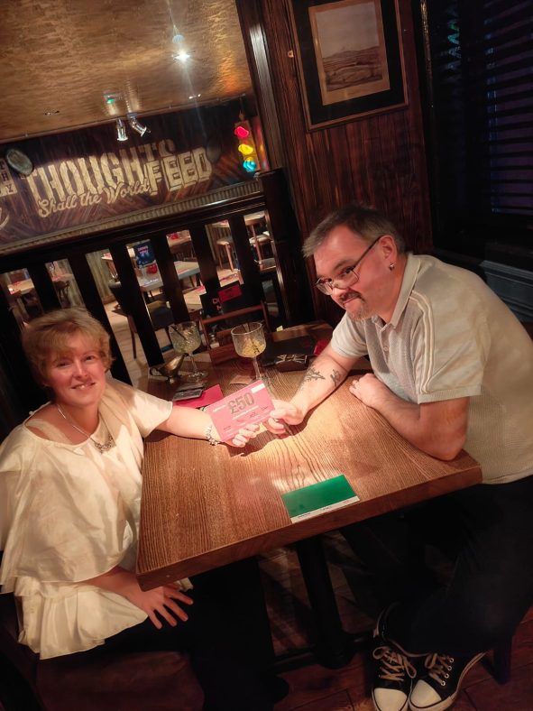Townscape Teaser winner, Rebecca Skermer enjoying her prize with her husband at the Red Bar & Grill
